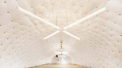 insulation and lighting inside of quonset building