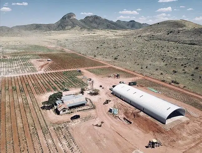 Skyview of large S-model Quonset storage building.